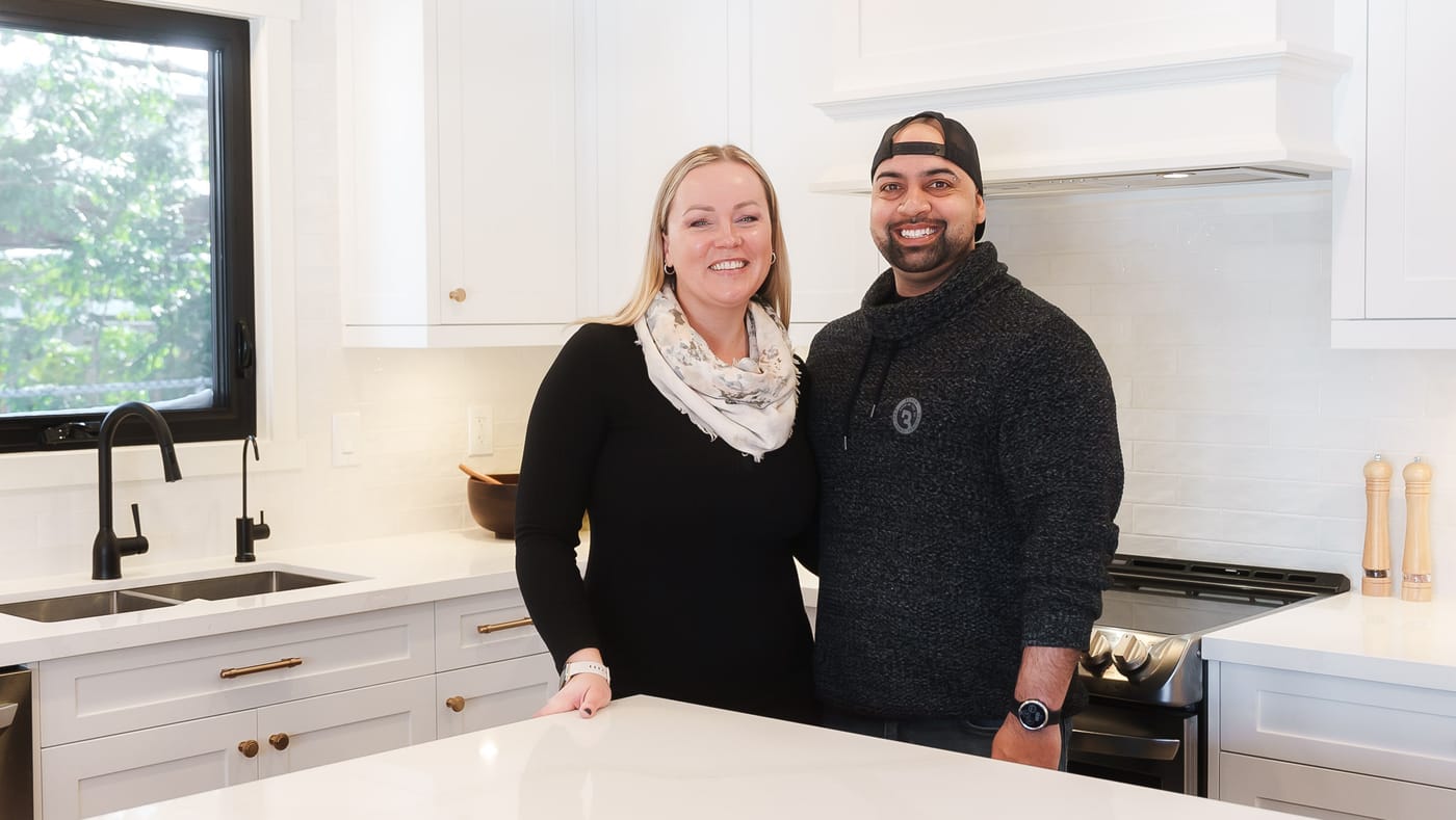The team behind AC Custom Reno in a finished client kitchen